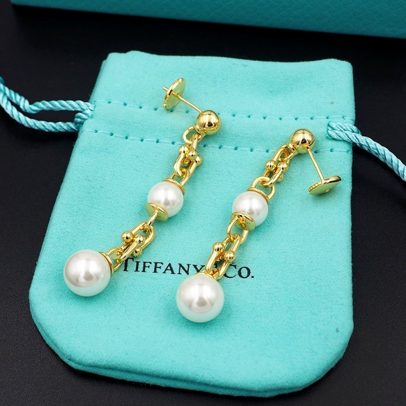 T*f*ny earrings